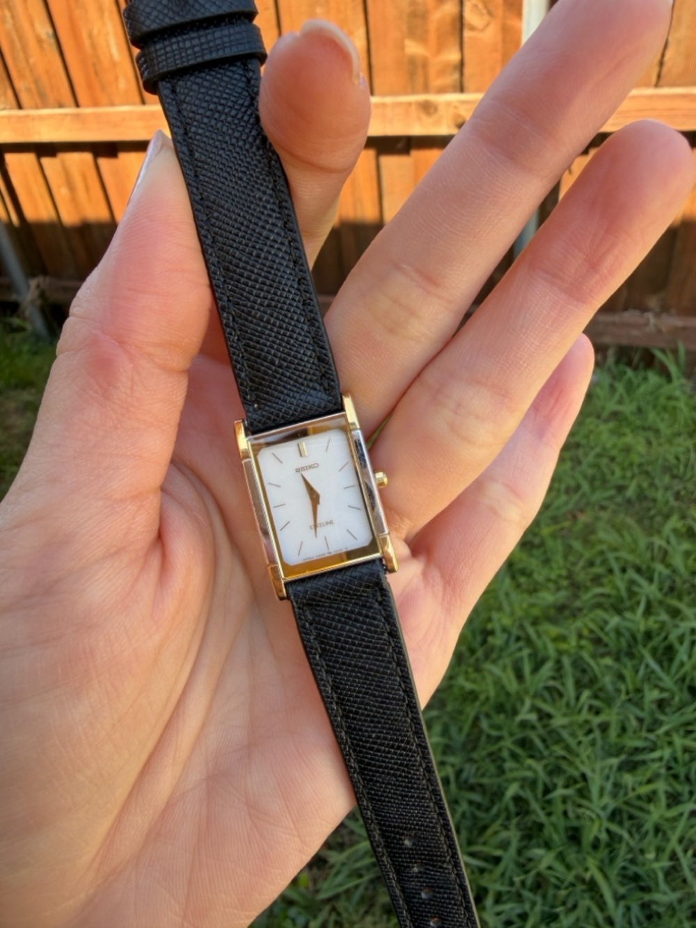 Seiko Gold Tone Rectangular Watch with Black Strap